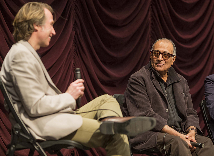 Abbas Kiarostami onstage with IU Cinema Founding Director Jon Vickers