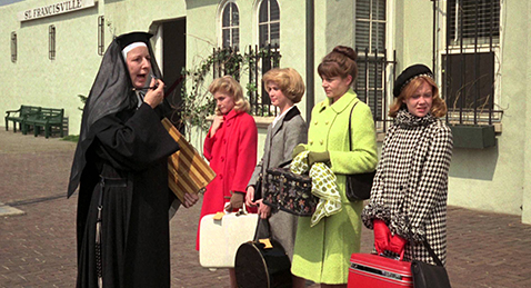 Still image of a four women and a nun on the street from the film The Trouble with Angels.