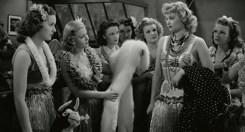 women dressed up at a party from the film Dance, Girl, Dance