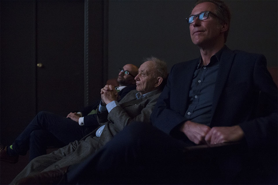 Frederick Wiseman, Robert Greene and Founding Director Jon Vickers watch a clip before an event at IU Cinema