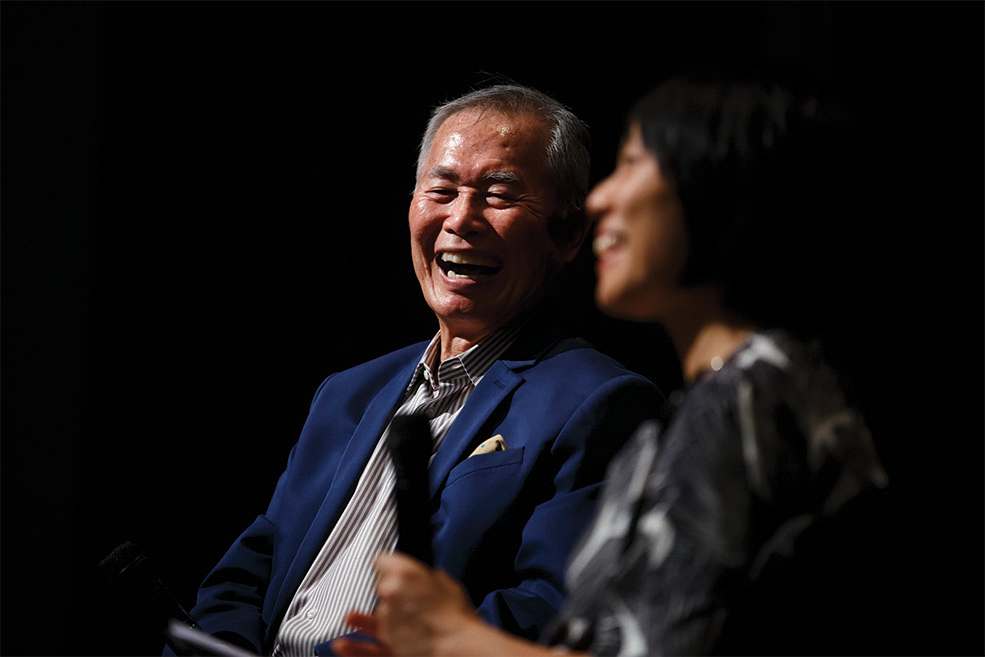 George Takei and Professor Ellen Wu onstage at IU Cinema