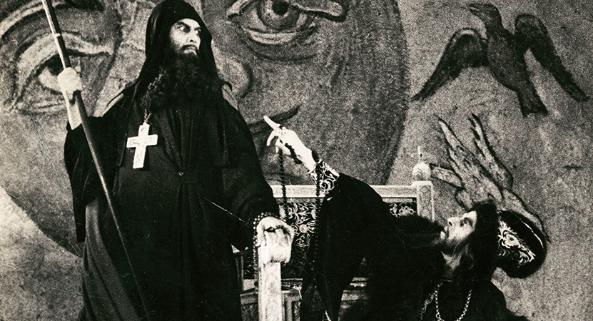 a priest looks down on another man from the film Ivan the Terrible, Part I