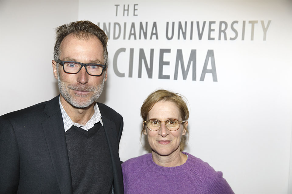 Kelly Reichardt and Founding Director Jon Vickers in the lobby of IU Cinema
