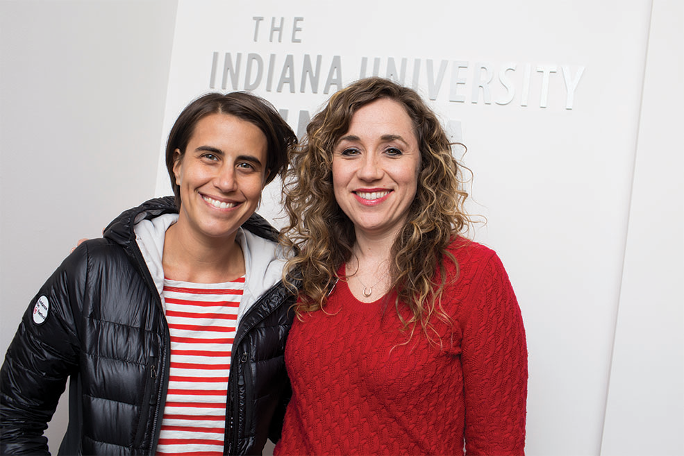 Kris Rey and Associate Director Brittany D. Friesner in the IU Cinema lobby before an event.