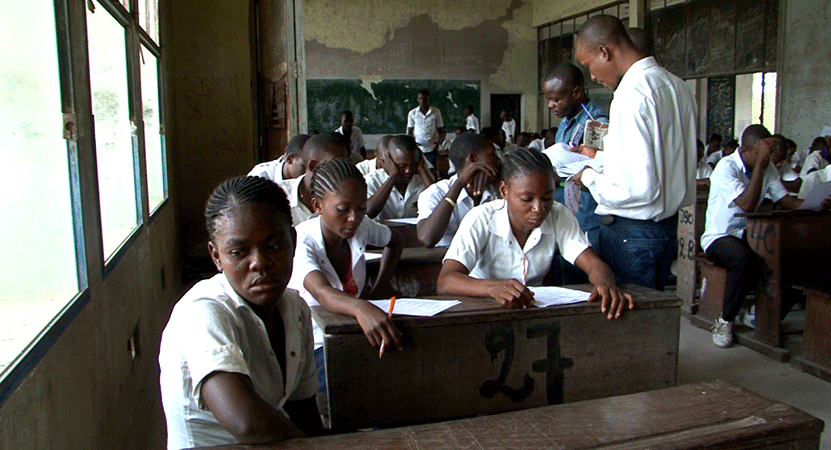 students sit in a classroom from the film Examen d’état (National Diploma).