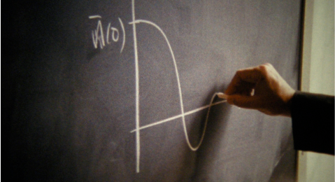 still image of a hand drawing on a chalk board from the film The Illinois parables.