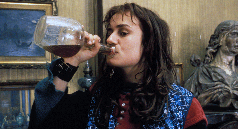 a women drinks from a bottle from the film Vagabond